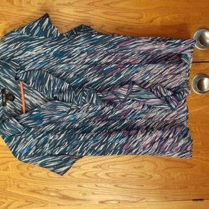NWOT Multi colored blouse with ruffled front
